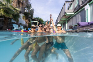 Upper Deck Hotel & Bar - Upper Deck Hotel & Bar Image of friend haing fun in the pool at Upper Deck Hotel & Bar in South Padre Island